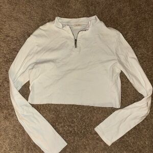 White Long Sleeve Zip-Up Crop Top by J Galt